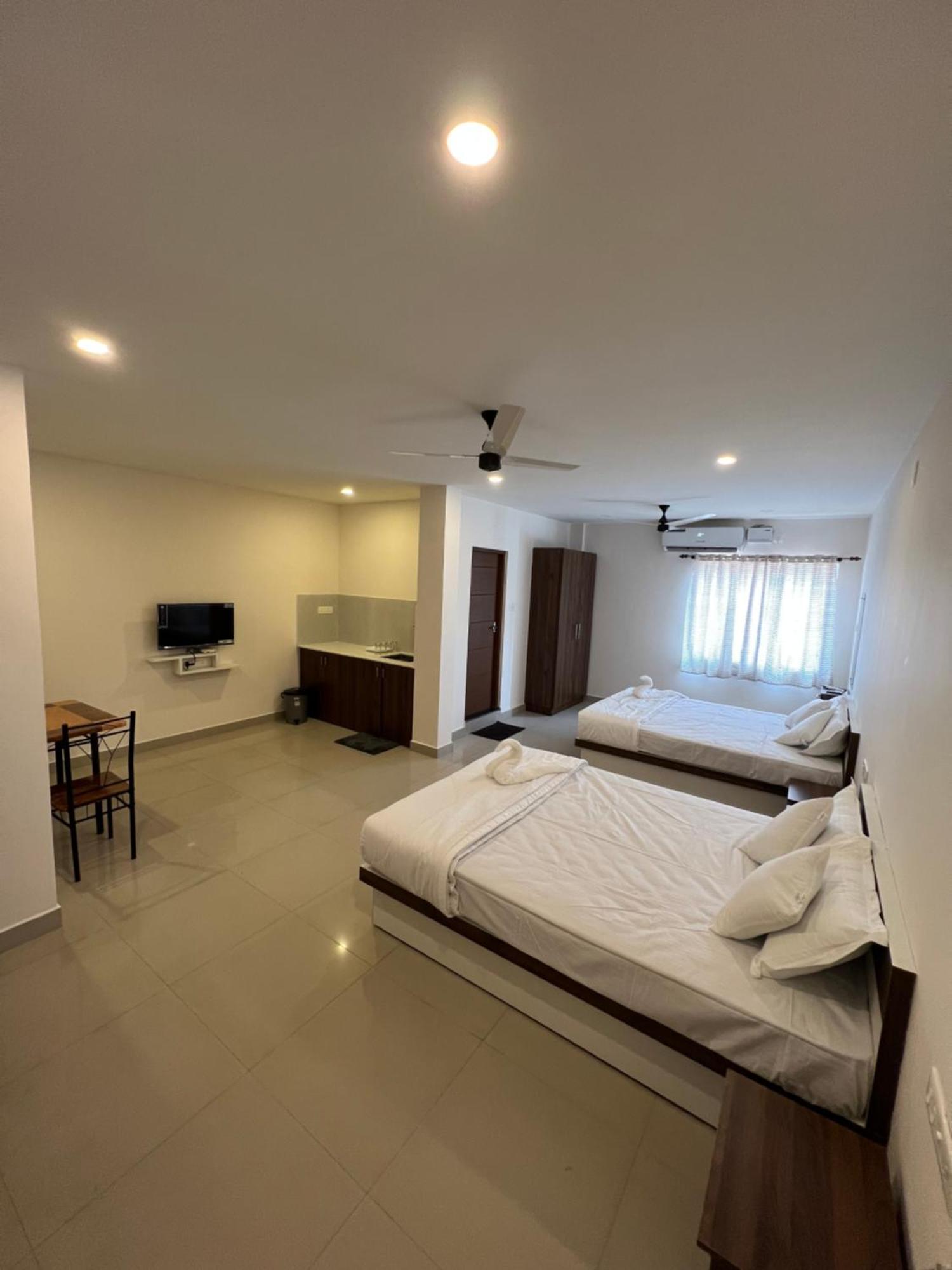 Heres Haut Residency Kochi Extérieur photo